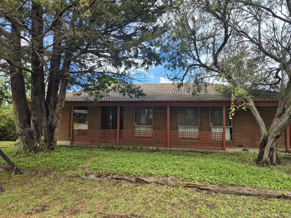 Charming Family Home With A Spacious Backyard & Prime Location!