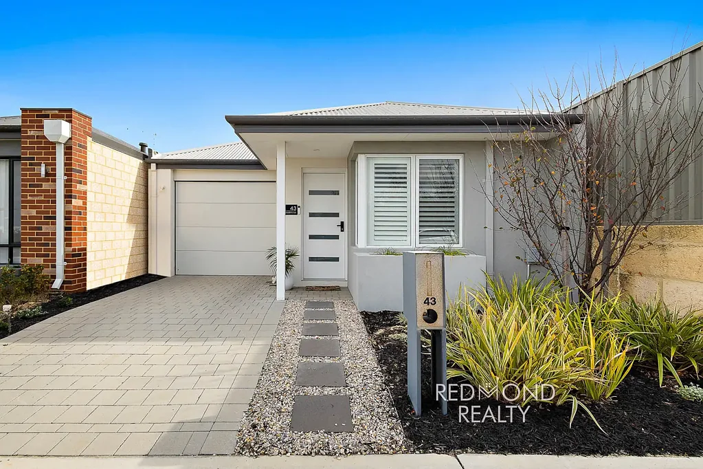 Modern Coastal Living Opposite Park in Sought-After Amberton Beach Estate!