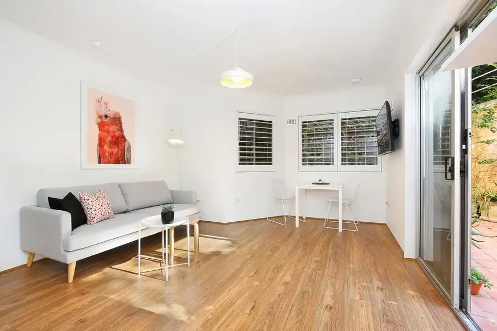 Fully furnished spacious ground floor 1 bedroom apartment with a large wrap around entertainers terrace