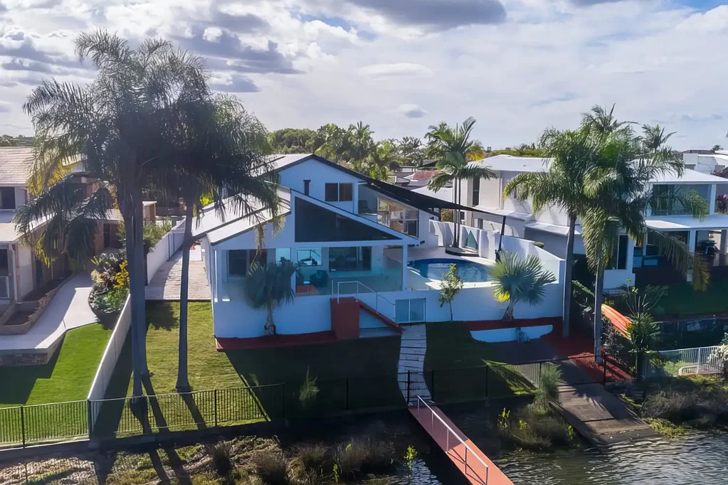 Modern Character Waterfront Home on Main River with Expansive Views in quiet Cul-de-Sac. Jetty and Ramp for your Boat or Jetski.