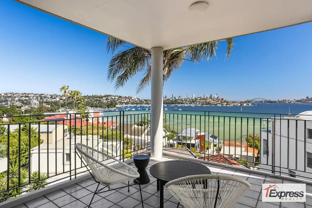 SPECTACULAR HARBOUR & CITY VIEWS - STYLISH FURNISHED TWO BEDROOM PLUS SUNROOM APARTMENT