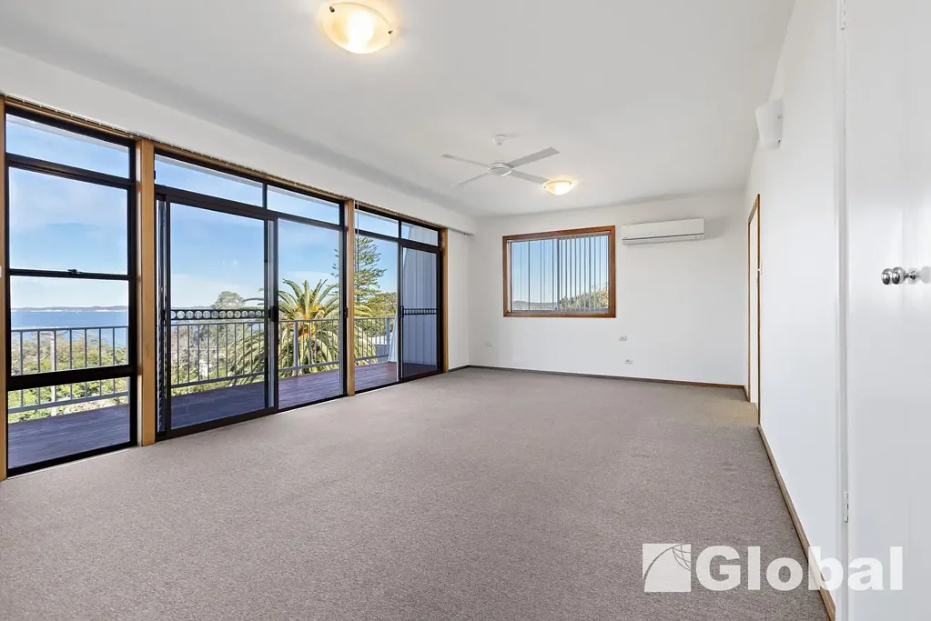 Charming Lakeside Home with Space, Views & Endless Potential