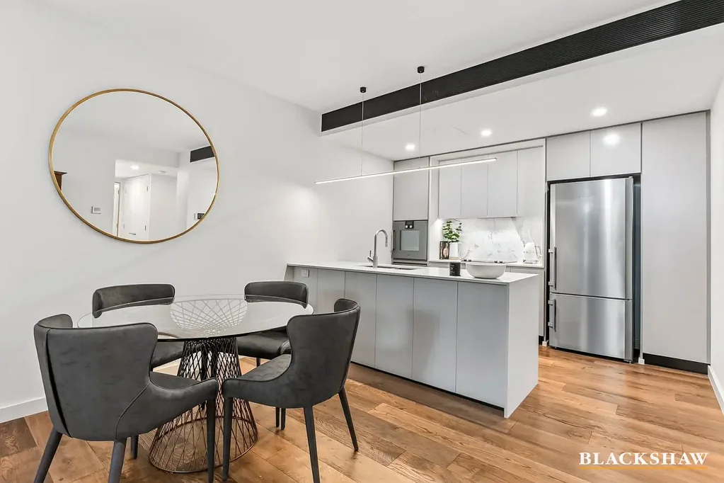 GROUND FLOOR LUXURY AWAITS AT THE ESTATE