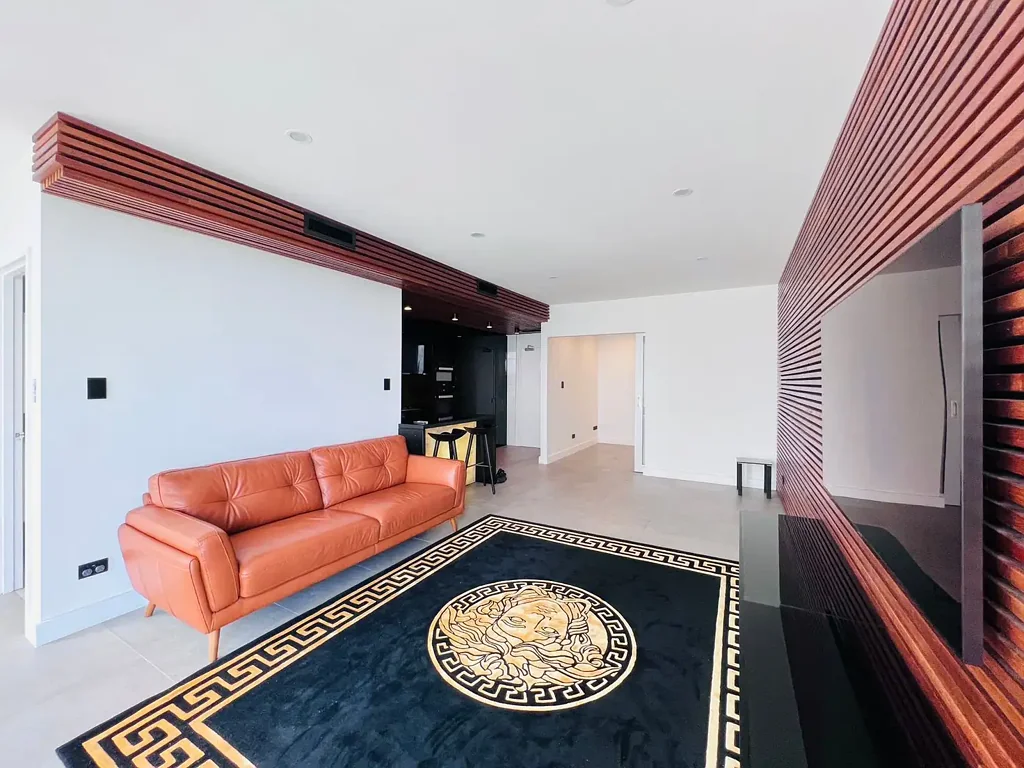 Renovated with timber flooring and feature wall