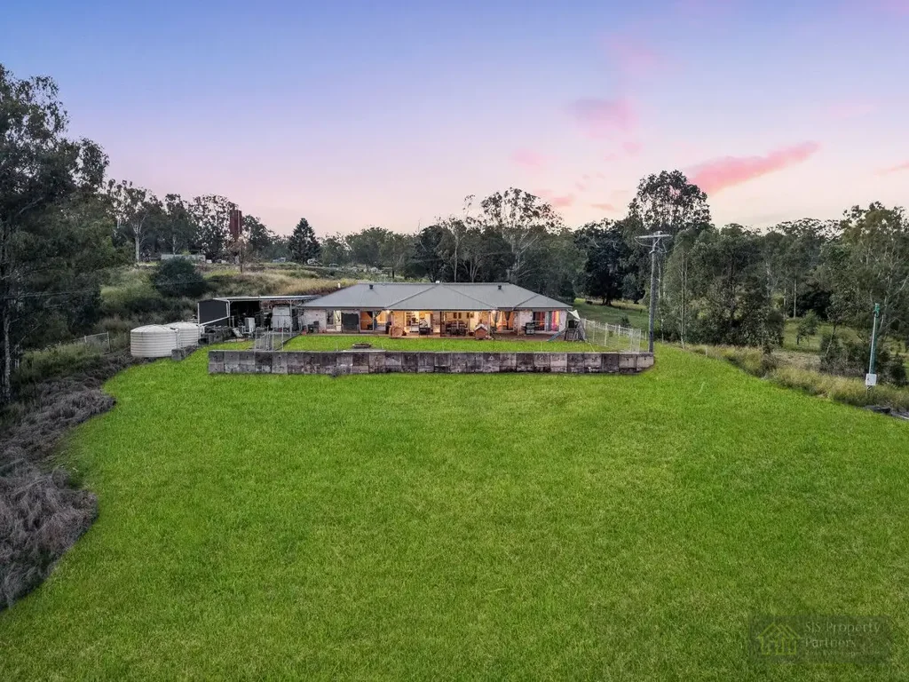 Borallon  Rare Dual-Living Acreage Opportunity – Held for 34 Years on 67.36 acres