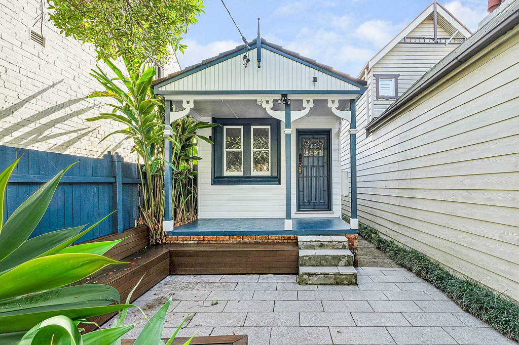 Bright Three Bedroom Home with Private Courtyards & Parking