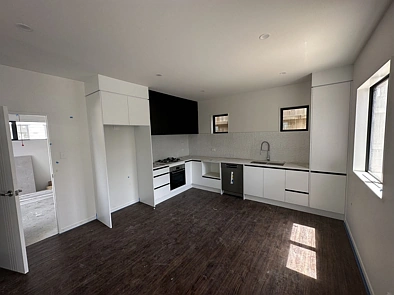 This brand-new house offers four bedrooms, 3 bathrooms, and a single garage.