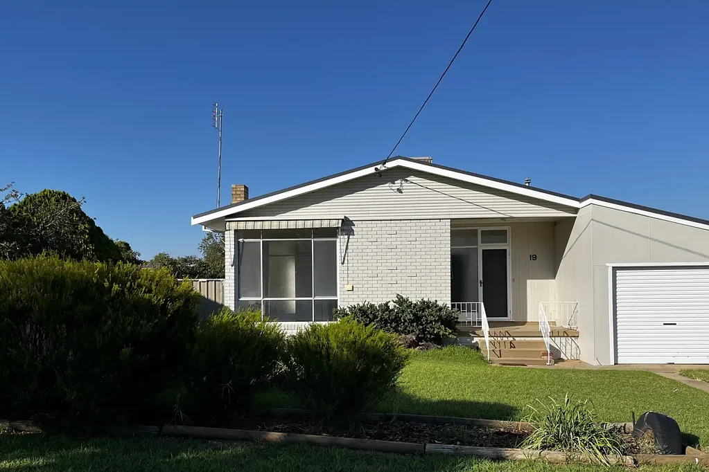 Charming Three-Bedroom Home with Rear Lane Access