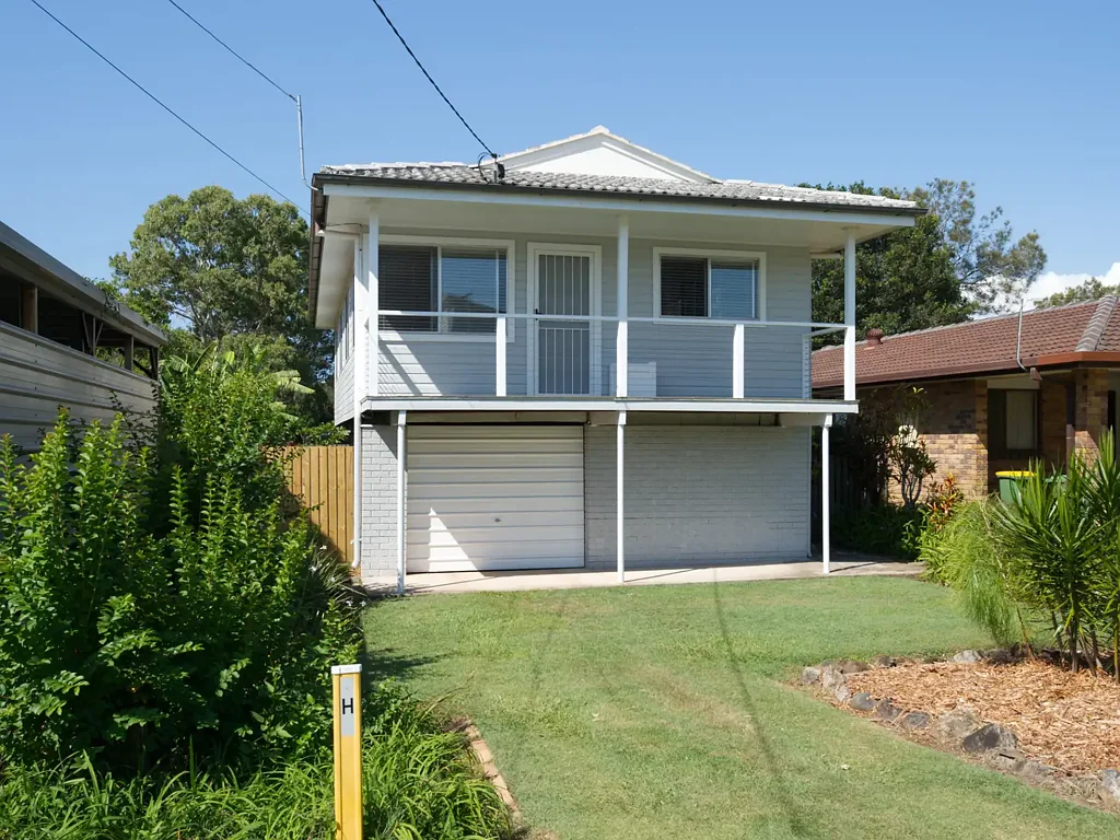 Modern Highset Home Just Steps Away from the Water!