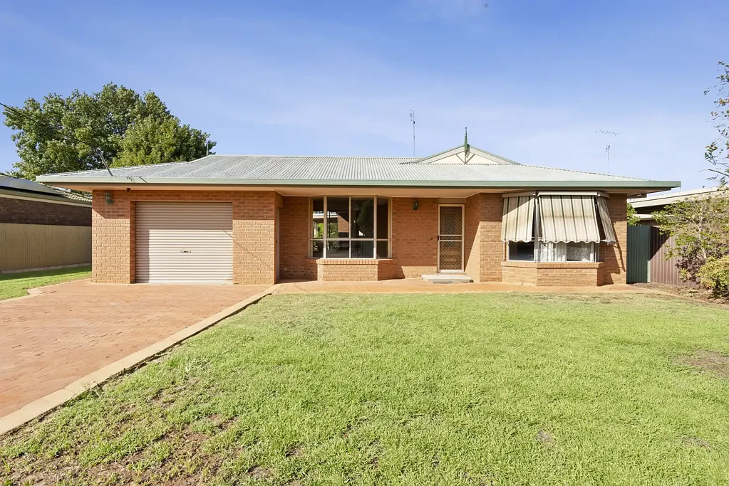 Charming Three-Bedroom Brick Veneer Home