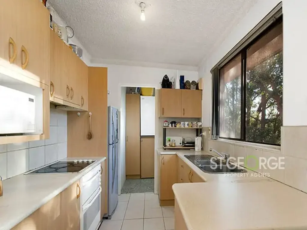 Ultra Convenient Two Bedroom Unit Located on the Top Floor