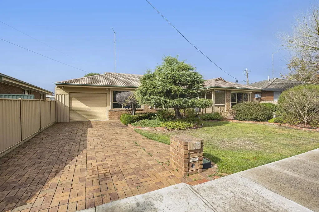 Charming Family Home with Established Gardens and Secure Car Accommodation