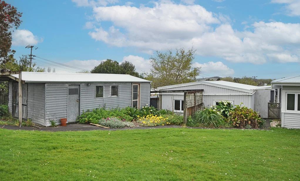 4 BEDROOMS, OFFICE AND LOTS OF SHEDS!