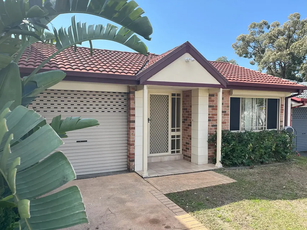 3 Bedroom Home with Pergola, waterfall pond, ducted aircon and cheap solar energy.