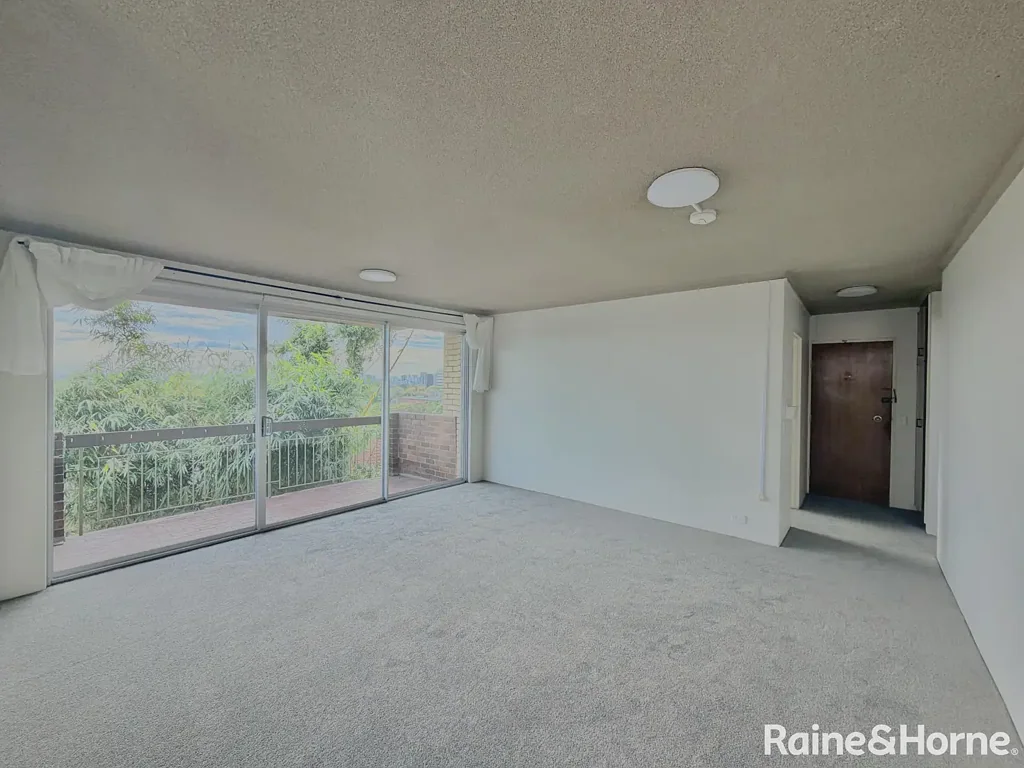 Quiet, Light-Filled Apartment with Balcony & Lock-Up Garage