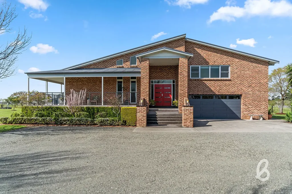 Singleton Architecturally Designed Home on approximately 5.75 Acres