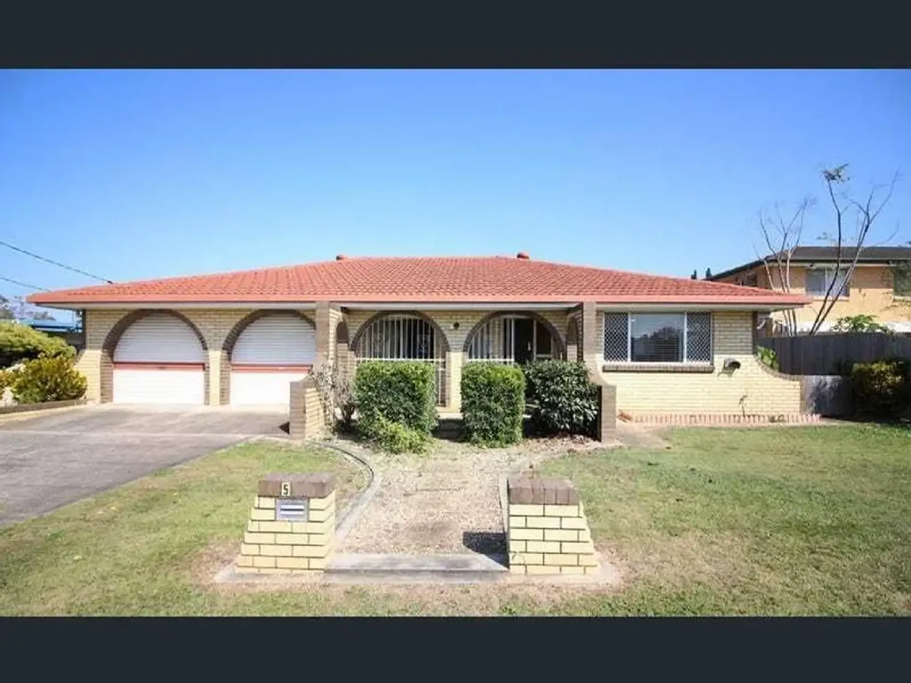 Spacious Four-Bedroom Home with a Large Backyard