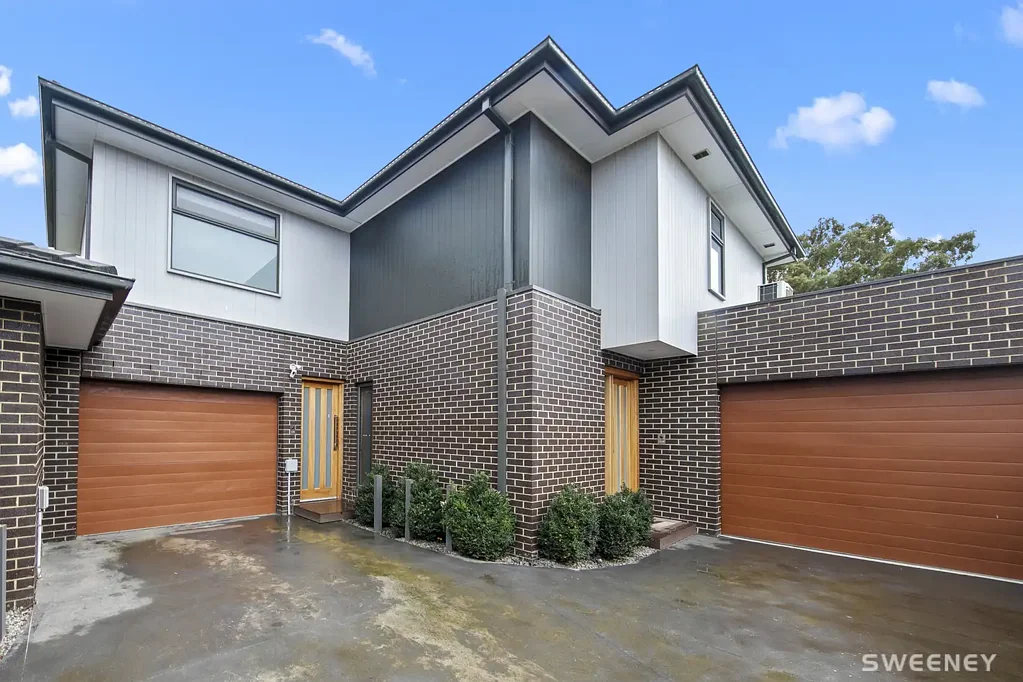 Chic two bedroom residence offering reverse style living in quiet convenient location