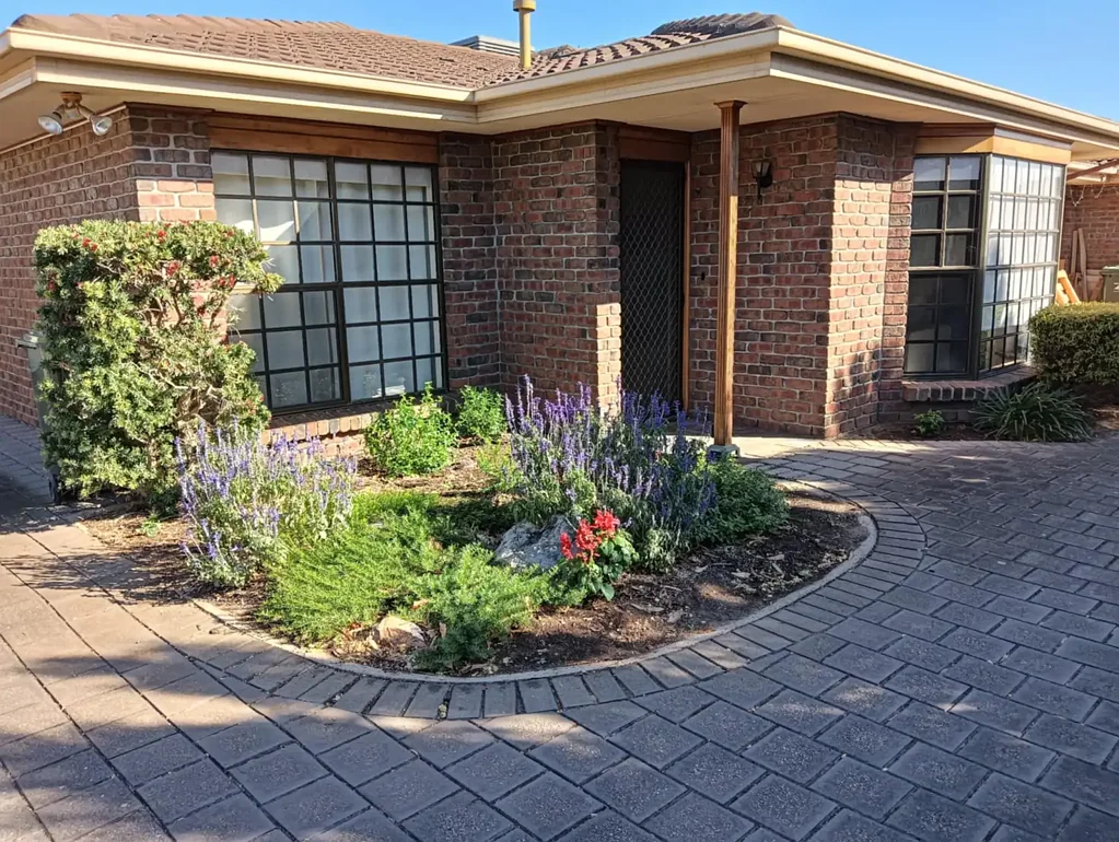 Generous unit with private garden in quiet block of three