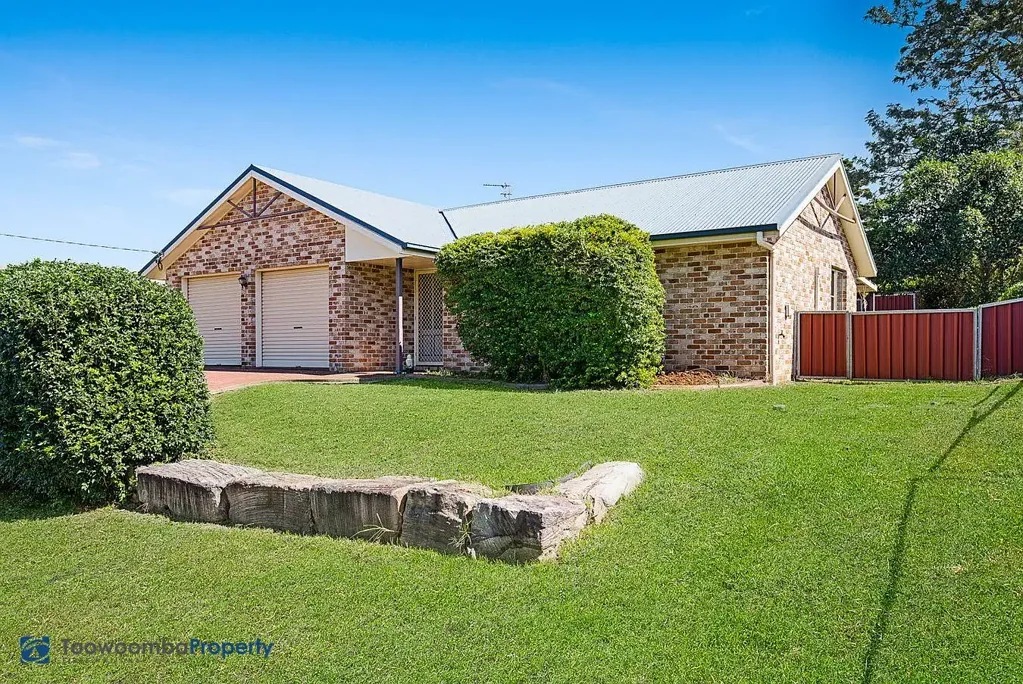 Spacious, four bedroom family home, conveniently located near shops, parks & USQ!
