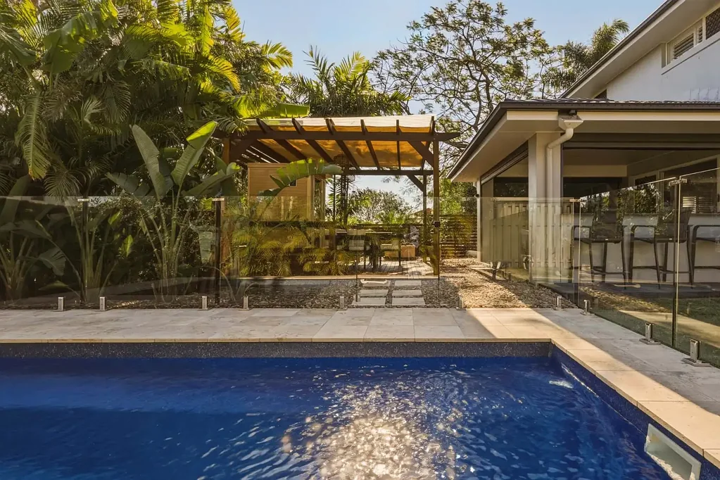 Nudgee 4 Bedroom Contemporary Family Living with a Resort-Style Pool