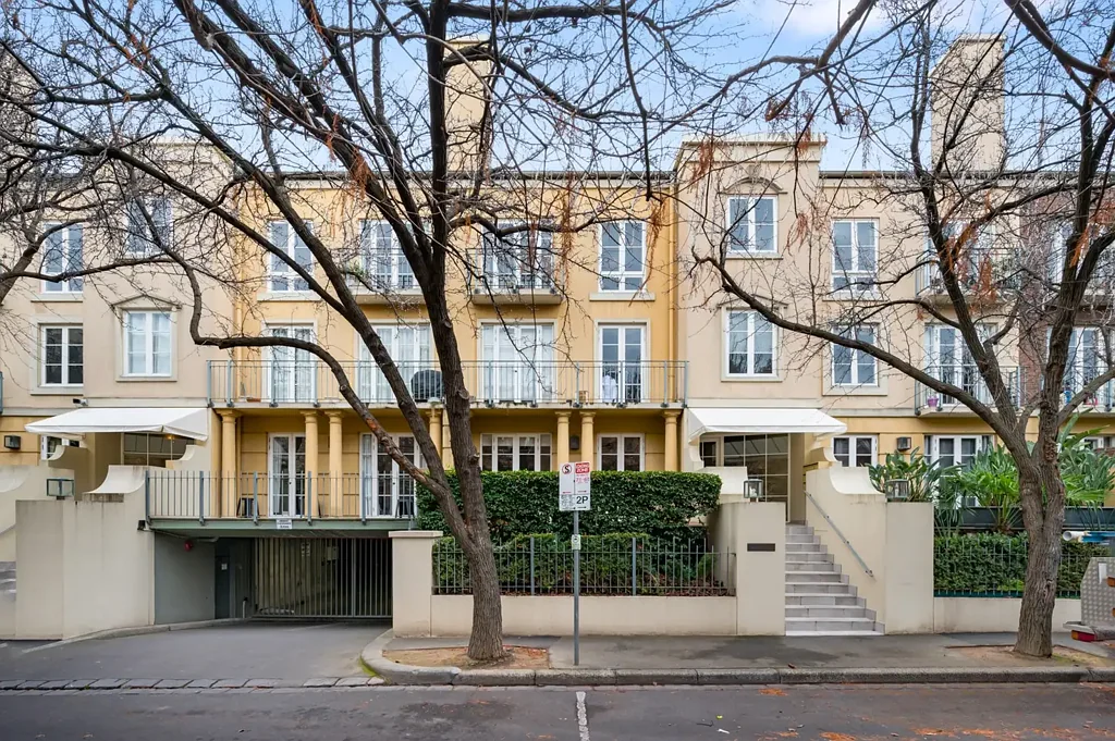 Elegant Multi-Level Residence with Study & Resort-Style Facilities in Prestigious East Melbourne