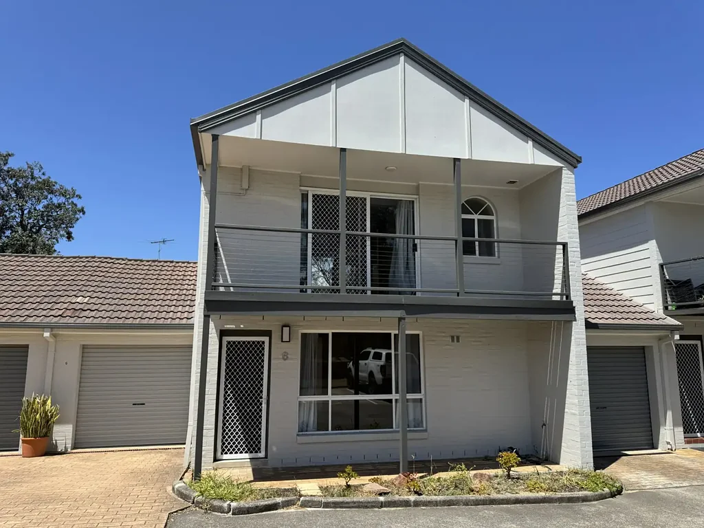 Low maintenance townhouse meters from the beach!