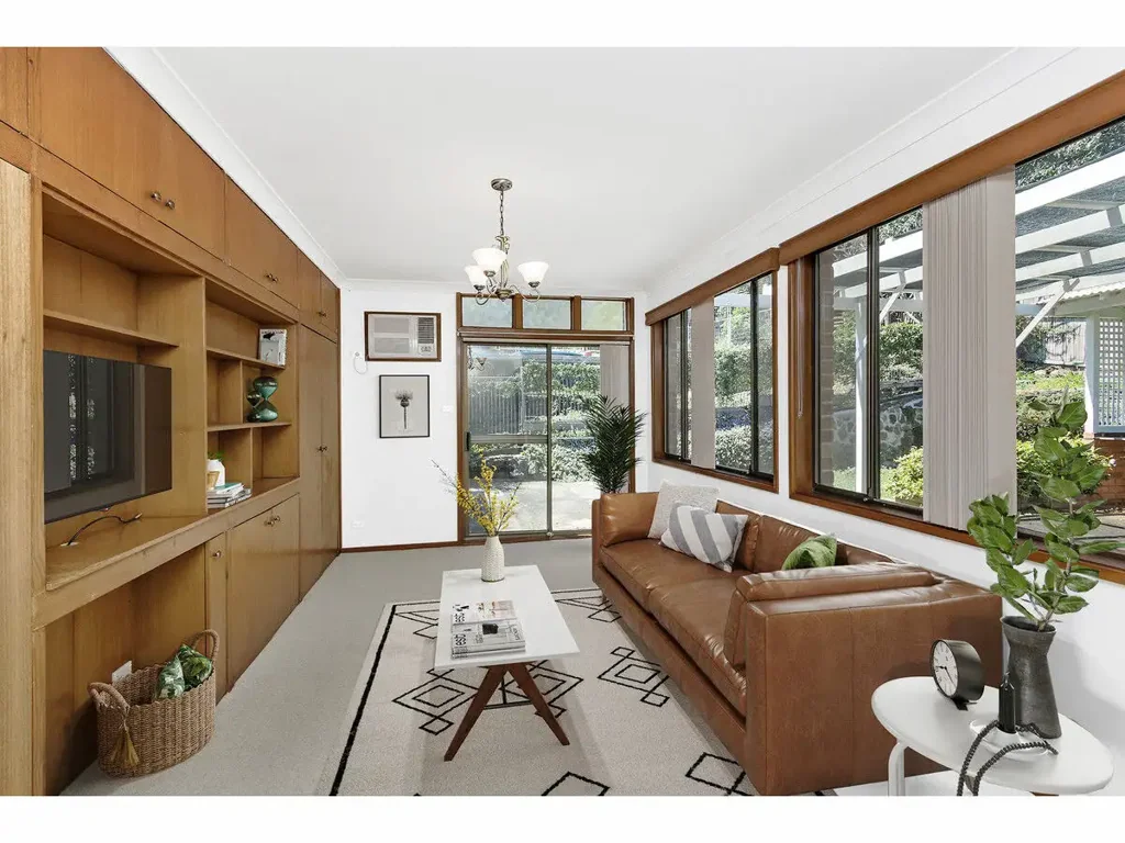 COMFORTABLE HOME WITH MULTIPLE LIVING AREAS AND GREAT STORAGE
