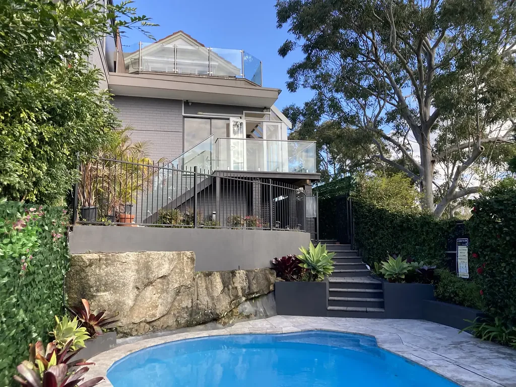 FAMILY HOME WITH WATER VIEWS, POOL & DOUBLE GARAGE