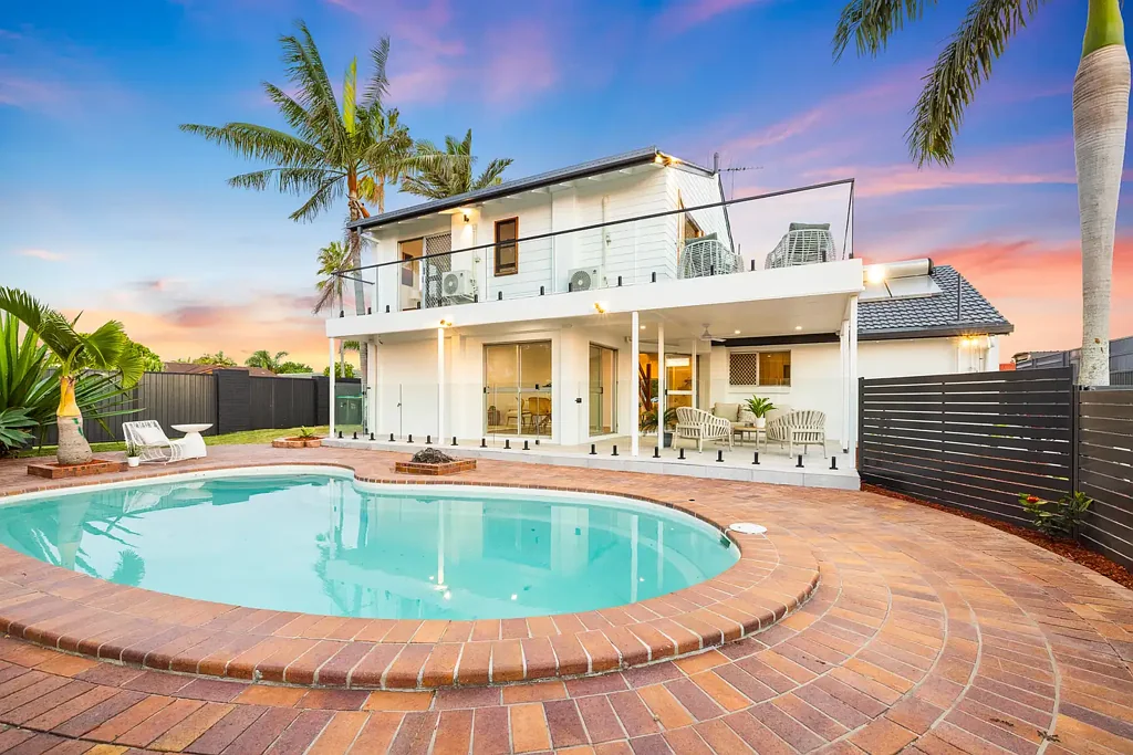 Fully Renovated North-Facing Waterfront Residence with Private Boat Ramp & Resort-Style Living