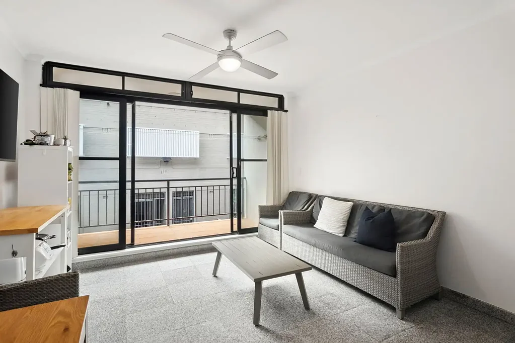 Furnished studio with balcony in a vibrant city setting