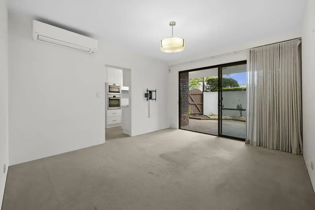 RENOVATED TWO BEDROOM GARDEN APARTMENT WITH PARKING