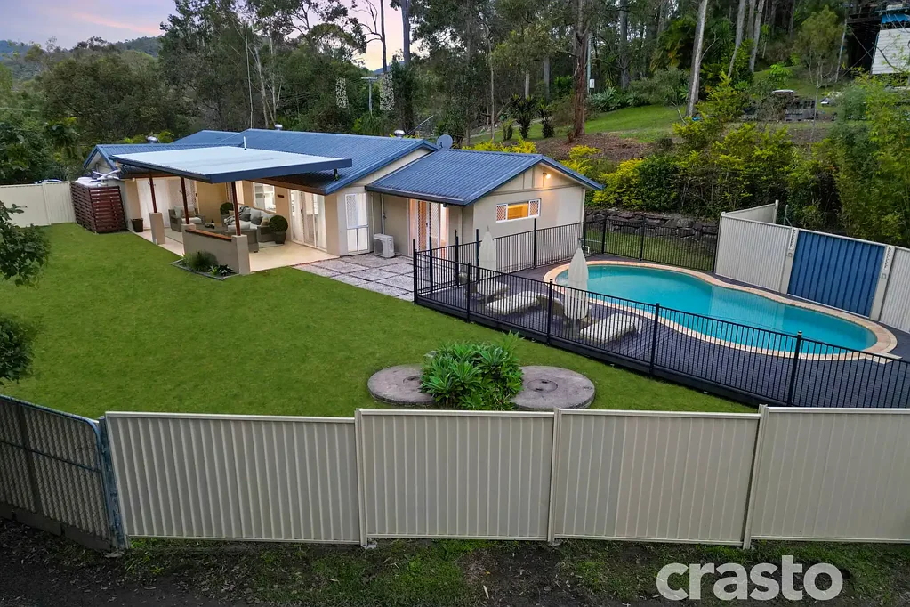 Bonogin 5 Bedroom Useable, Lush, Well Presented Home with Pool, Tropical Gardens and Shed