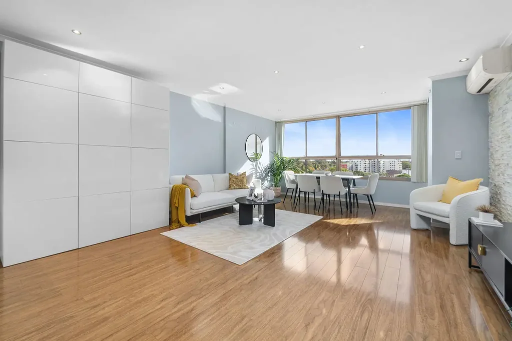 Homebush 2房 Camellia Tower时尚公寓 220米近站 明亮客厅 阳台观景 石材厨房 主卧套间 度假村设施 地下车位 Resort-inspired apartment set within a 220m walk of Homebush Station