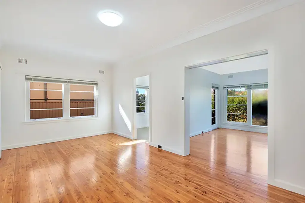 Light-Filled Apartment with Private Backyard and Lock-Up Garage