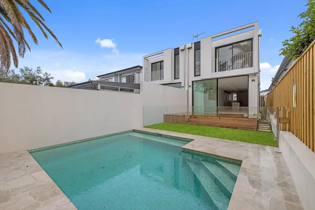 Brand New North Facing Semi With Large Garage & Heated Pool!