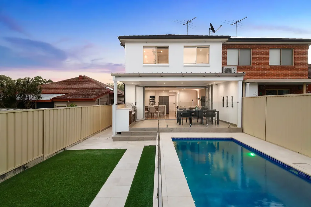 Full brick entertainer’s haven with inground pool