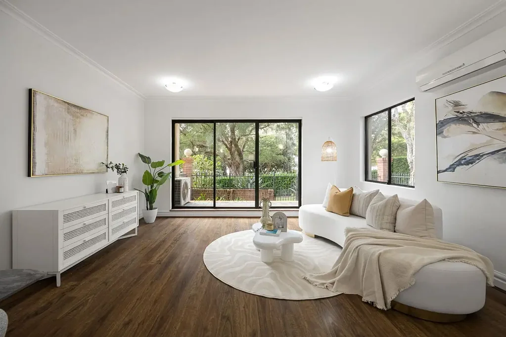 Elegant double brick townhouse welcomes elevated bay and park views on the waterside