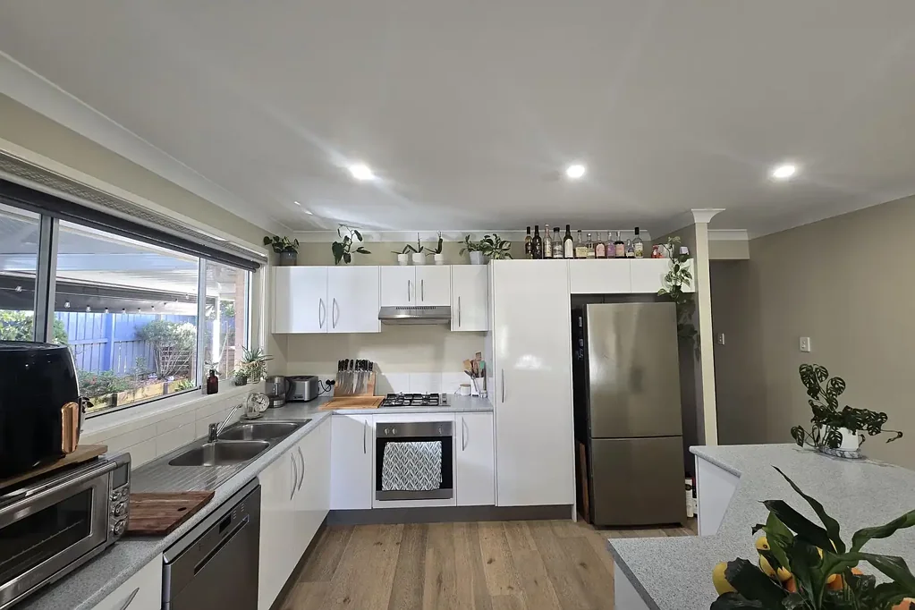 Spacious Four-Bedroom Home with Solar, Double Garage & Gardens