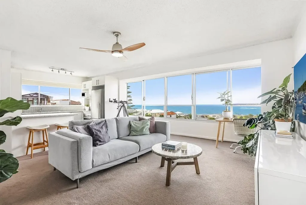 Sun-Drenched Beachfront Retreat With Front Row Seats To Sweeping Ocean and Headland Views