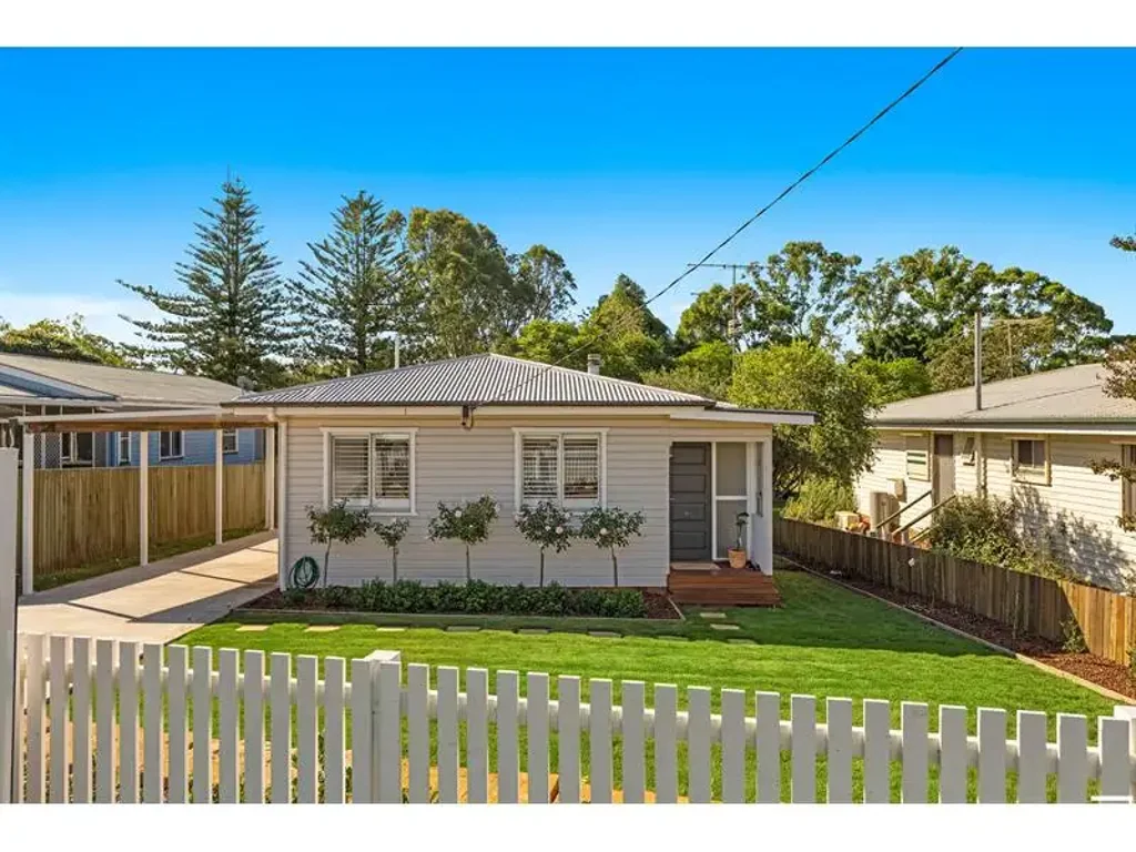 Fully fenced with Rear Deck; AC to living and Main Bedroom
