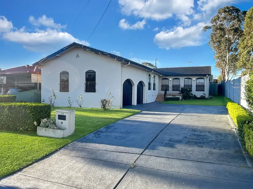 Clean four bedroom family home with in-ground swimming pool and covered outdoor entertainment area!