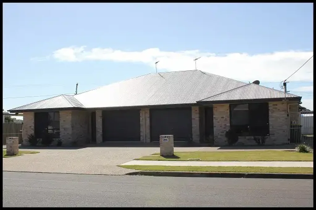 Executive 2 bedroom unit in a great location with high clearance powered shed