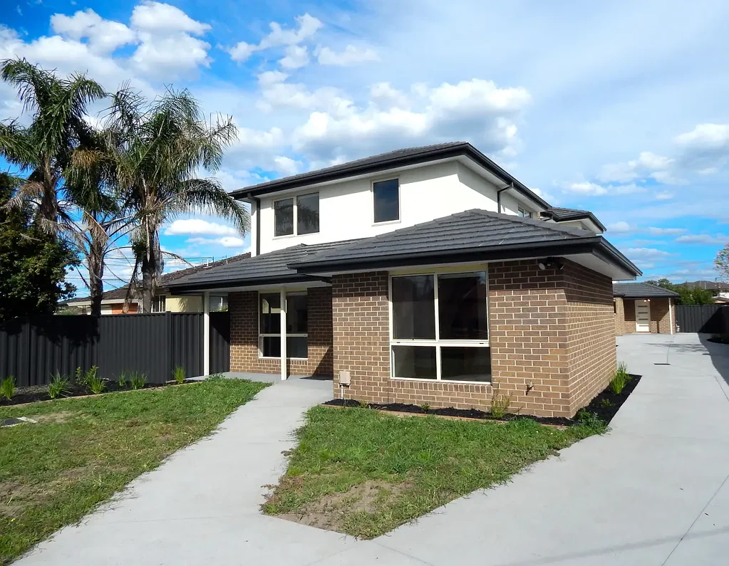 Near New & Bursting with Natural Light!