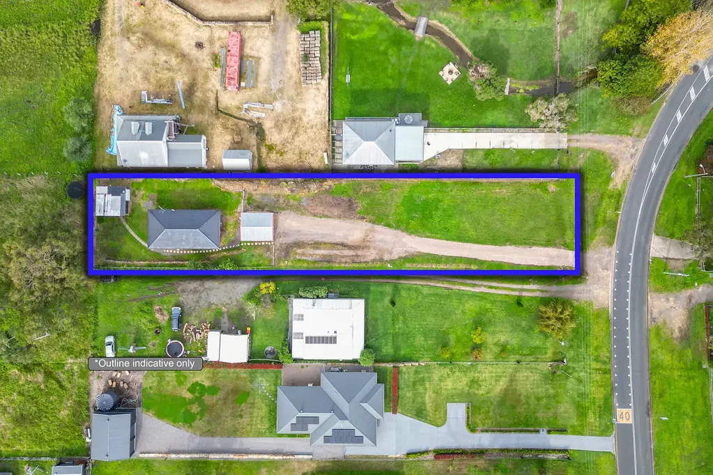 Clarence Town 3 Bedroom BRICK BEAUTY ON HALF AN ACRE IN THE HEART OF CLARENCE TOWN