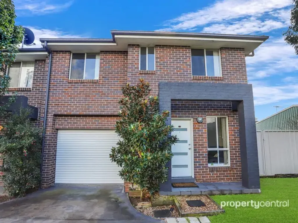 WELL PRESENTED MODERN FOUR BEDROOM TOWNHOUSE WITH YARD