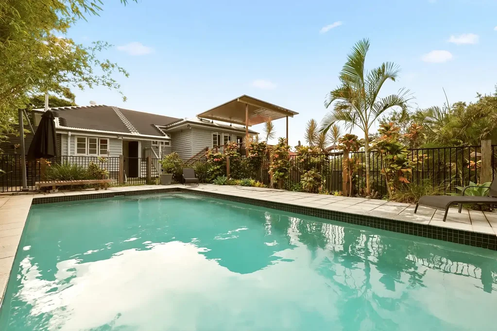 Renovated Family Home with Heated Pool, Entertaining Deck & City Views