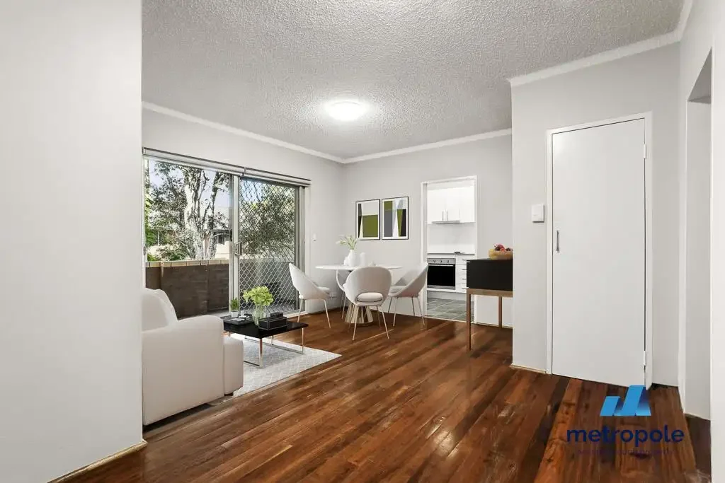 TASTEFULLY RENOVATED AND CONVENIENTLY LOCATED 2-BEDROOM UNIT