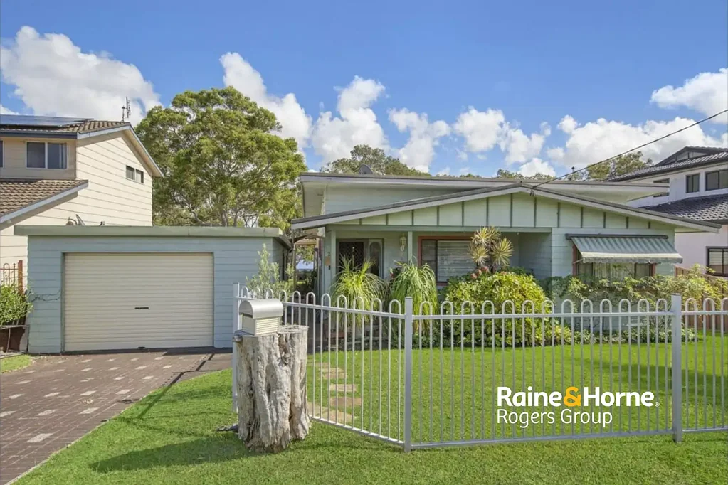 Waterfront Living with Panoramic Lake Views and Inground Pool