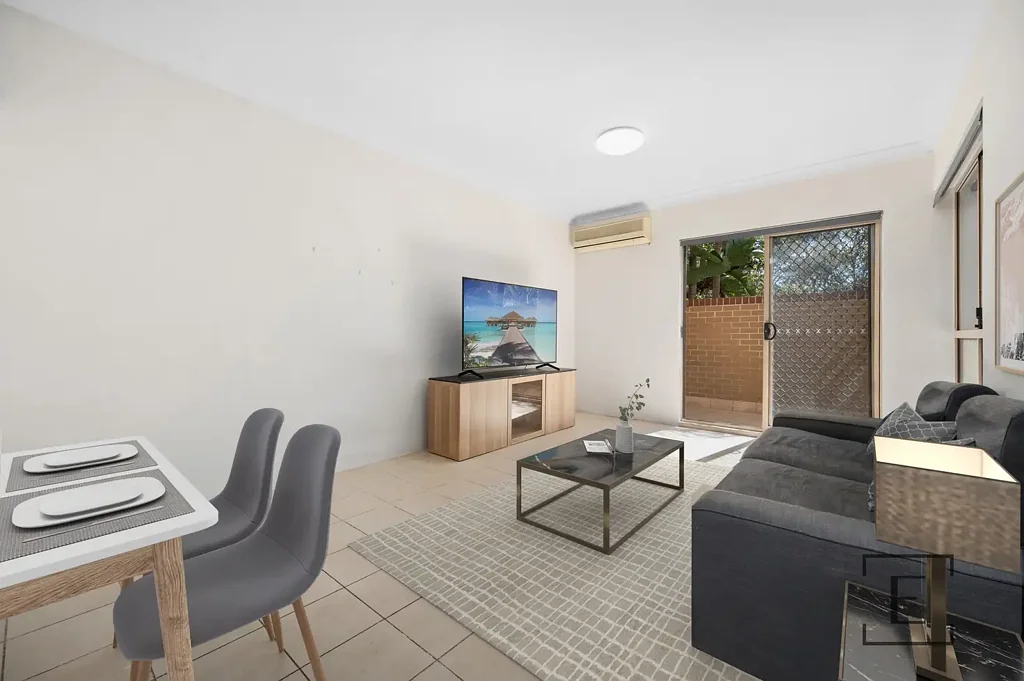 Ground Floor Apartment with Oversized Courtyard !